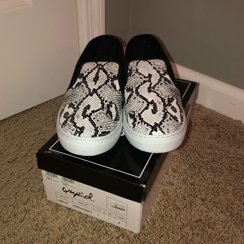 Brand new Qupid snakeskin slip ons